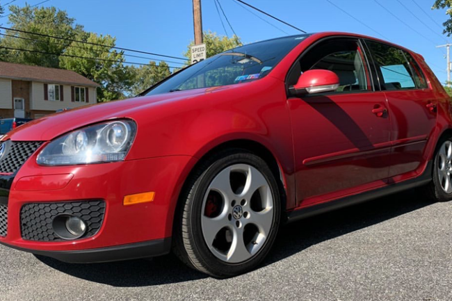 Gloss Burgundy-color-change-car-vinyl-wrap-knoxville-tennessee left bumper