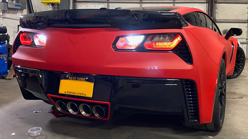 Red wrap paired with black accents