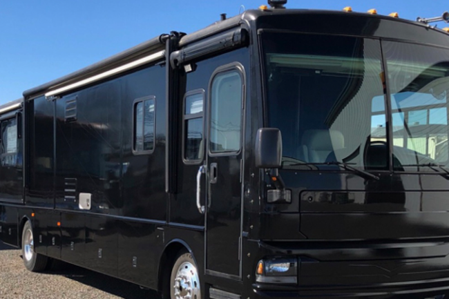 Gloss black-color-change-car-vinyl-wrap-knoxville-tennessee bus